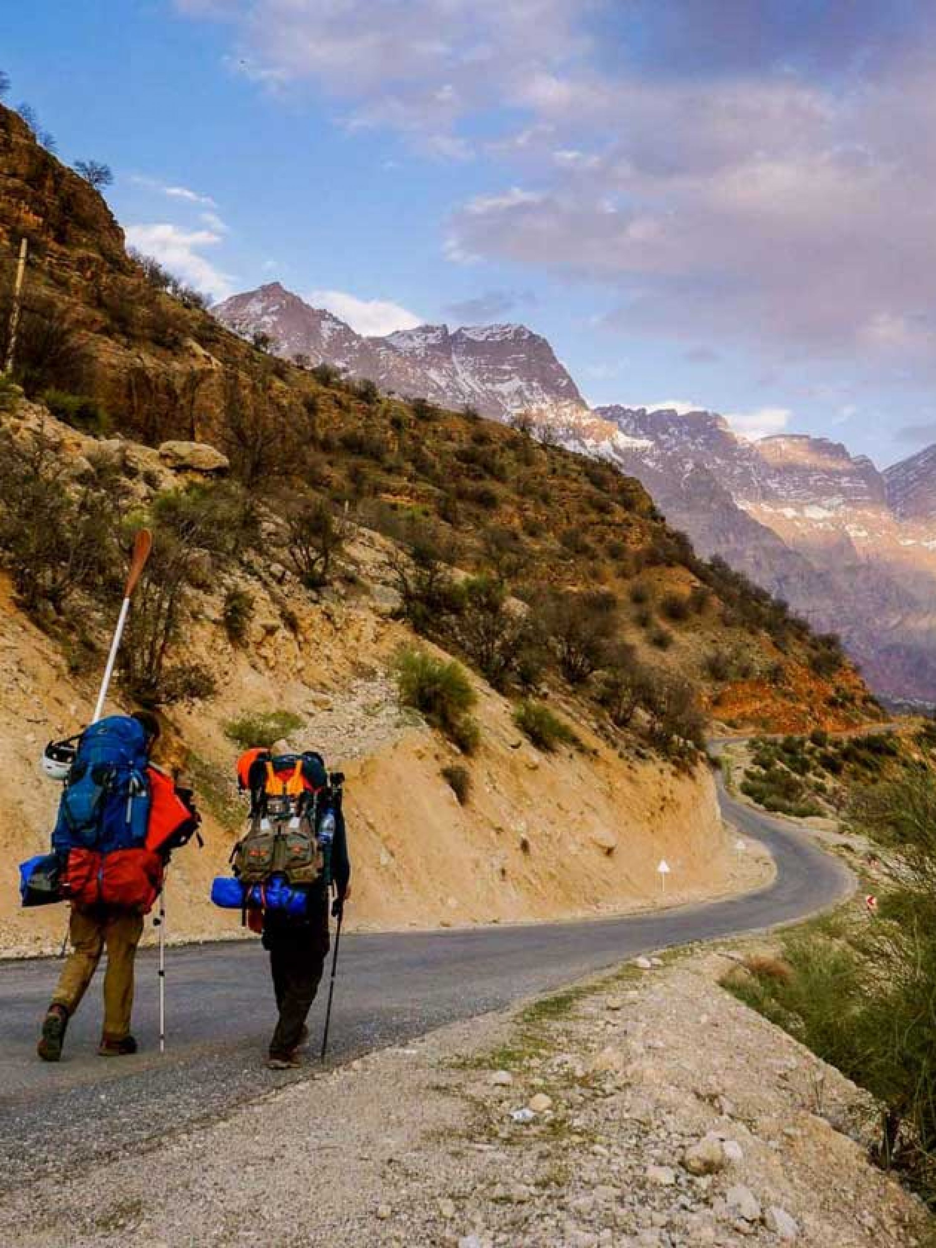Hero-Iran-travel-op-ed-Leon-and-Tom-walking-through-mountains-following-the-river-Karun-Photo-credit-Leon-McCarron-1920x1080
